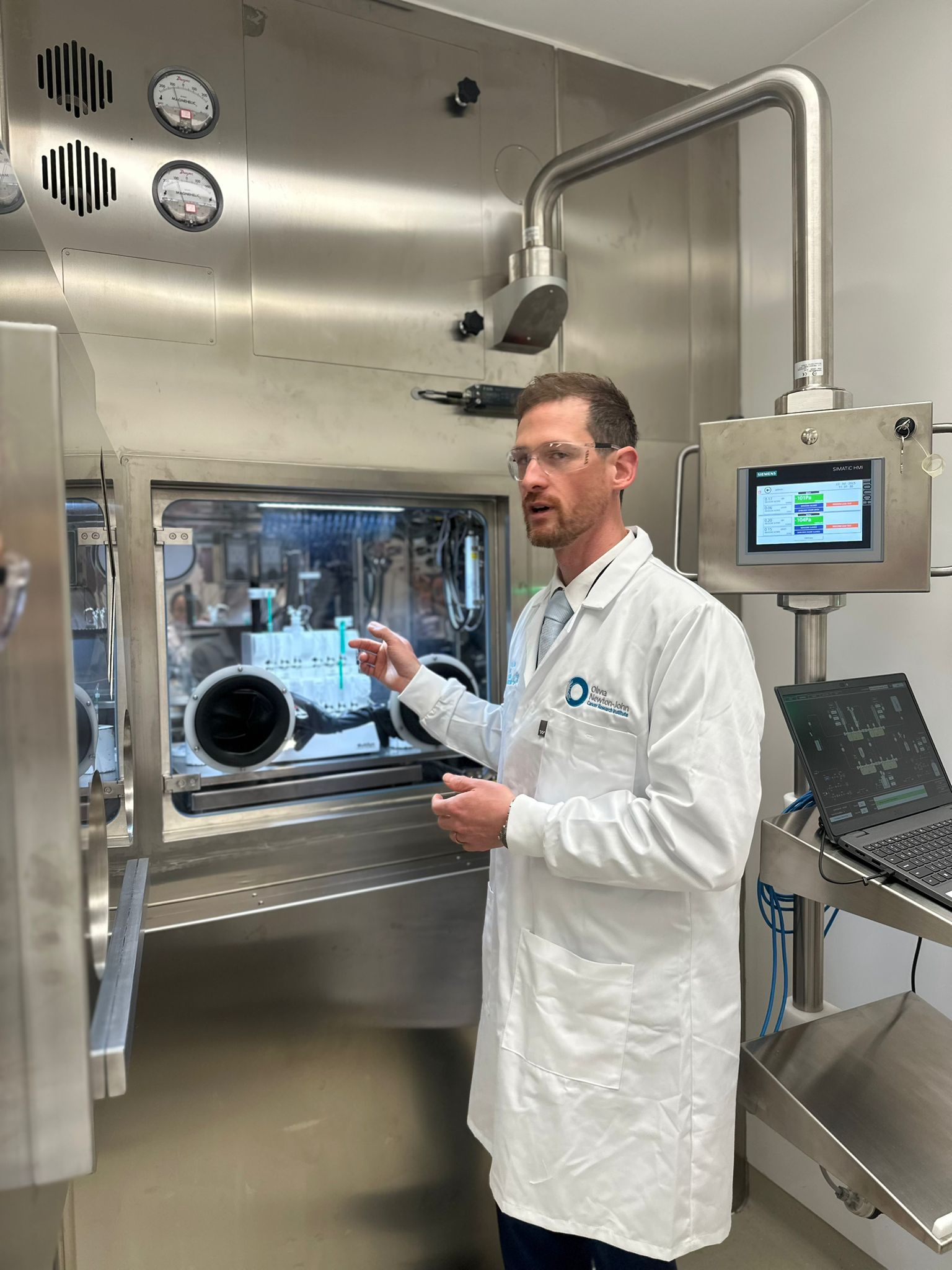 Dr-Christian-Wicjmann-with-hot-cell.jpg