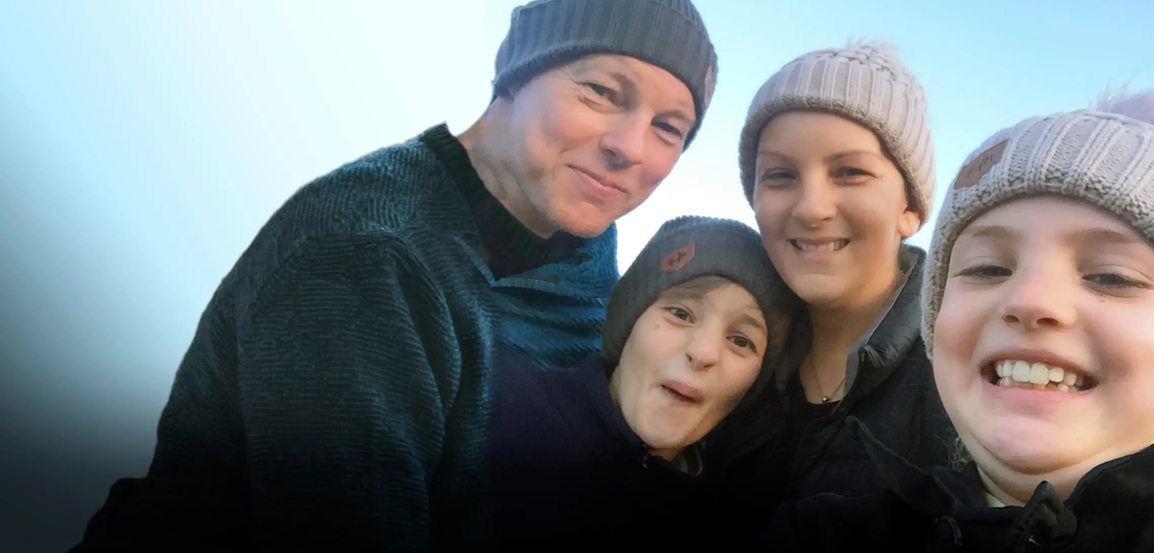Jacqui with her family on holiday