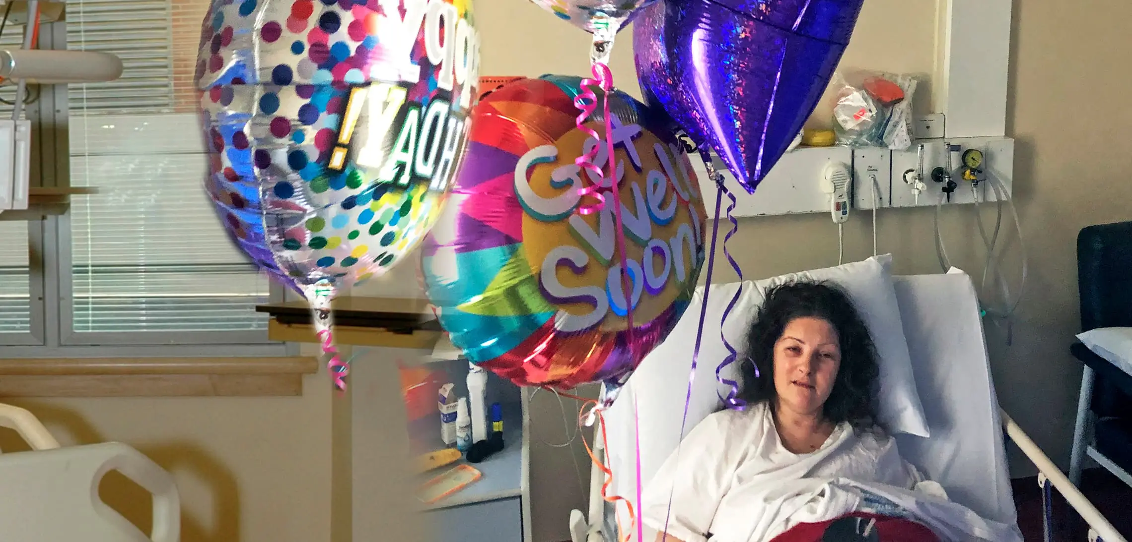 Jacqui in the hospital bed passing her last days
