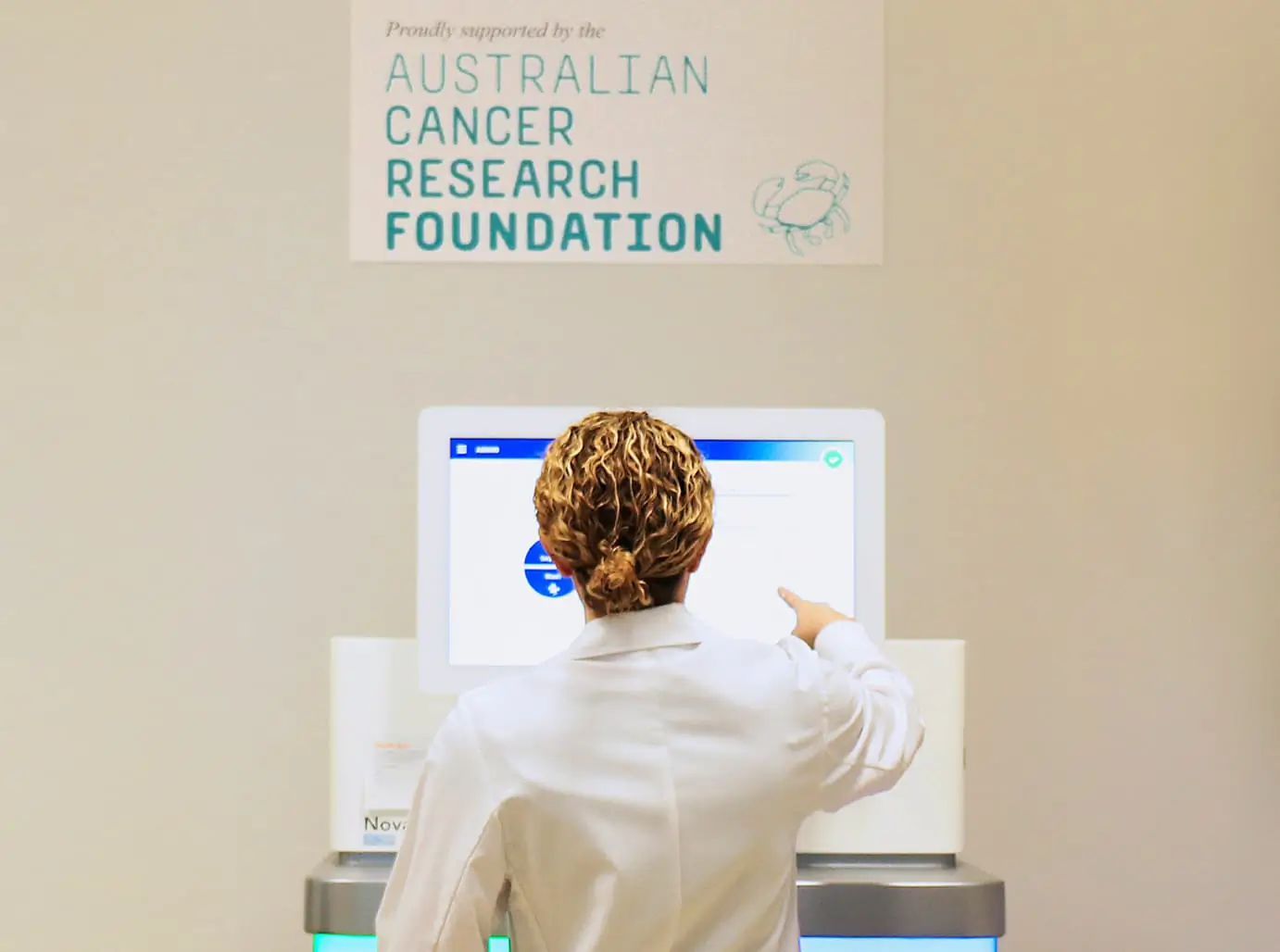 A researcher looking at Genomics' data