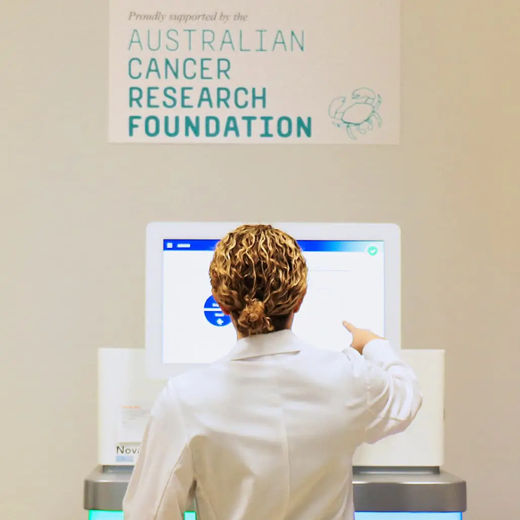 A researcher looking at Genomics' data
