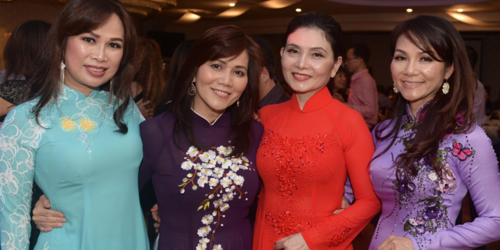 Women enjoy themselves at a fundraising gala ball held by Sydney's Vietnamese community.